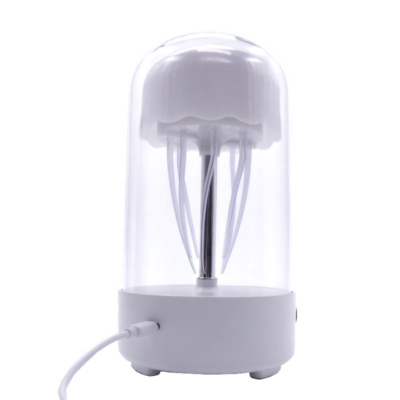 Discover Jellyfish Table Lamp! Lifelike LED-lit 'jellies' float gently, creating a hypnotic underwater glow for captivating ambient decor